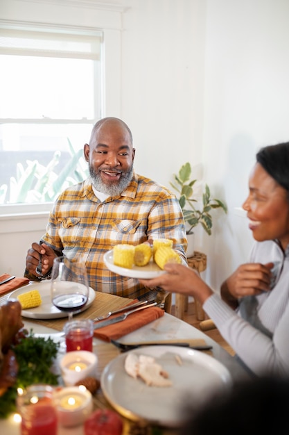 Free Photo Family Enjoying The Thanksgiving Day Dinner