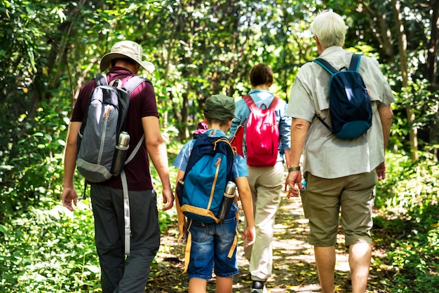 Premium Photo | Family hiking in a forest