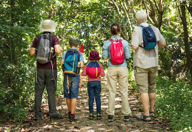 Premium Photo | Family hiking in a forest