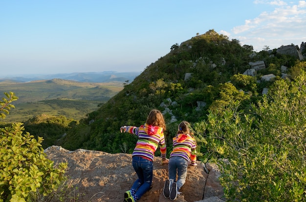 Premium Photo Family Travel With Children Kids Looking From Mountain Viewpoint Holiday Vacation In South Africa