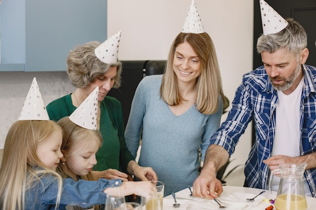 Premium Photo | Family and two their daughters have a celebration of ...