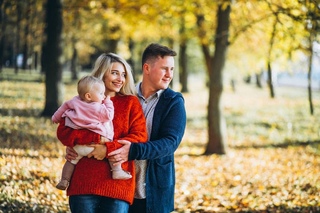 Family with baby daugher in an autumn park Free Photo