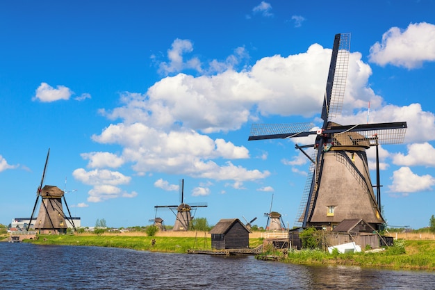 Famous windmills in kinderdijk village in holland. Premium Photo