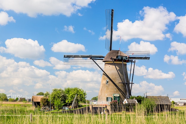 Premium Photo | Famous windmills in kinderdijk village in holland.