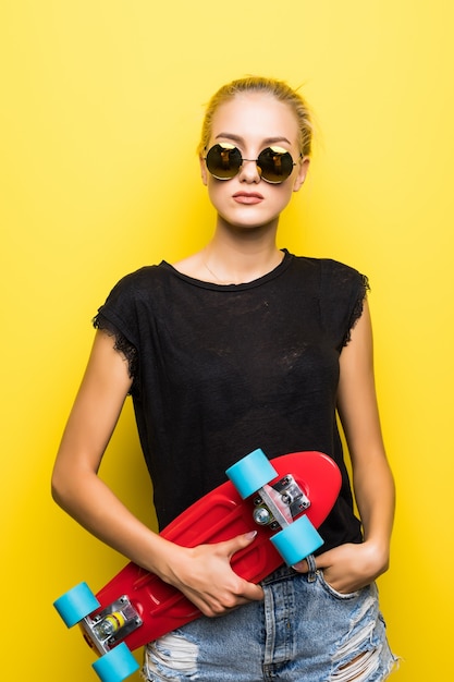 Free Photo | Fashion pretty cool girl in sunglasses with skateboard ...