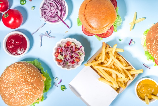 Premium Photo | Fastfood, burger party concept. various delicious ...