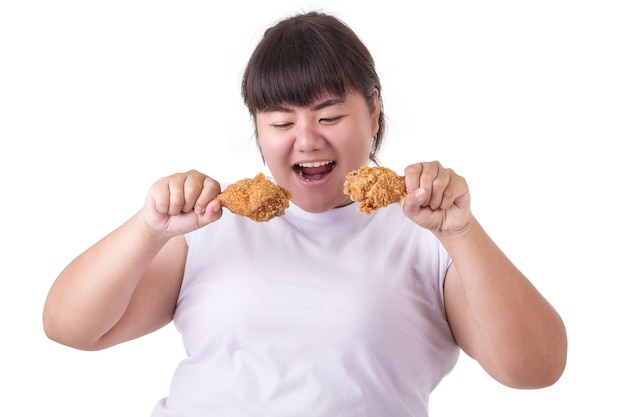 Fat Asian Woman Holding And Eating Fried Chicken Photo