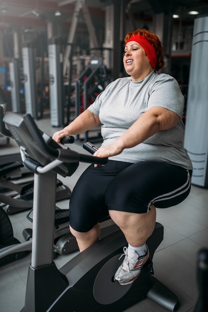 fat woman on bike