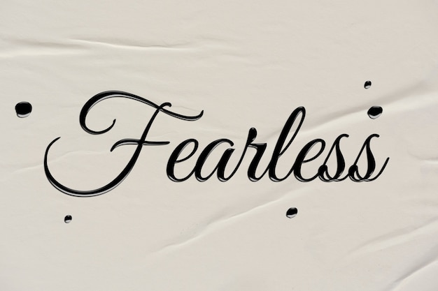 Free Photo | Fearless Word In Ink Calligraphy Style