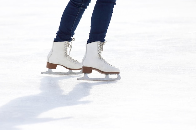 Premium Photo | Feet skating on the ice rink