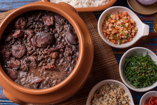 Premium Photo | Feijoada dish made with black beans, pork, and sausage