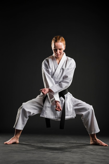 Free Photo | Female doing karate pose full shot