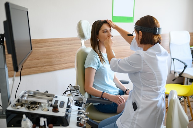 Premium Photo Female Ent Doctor And Patient In Office Exam Nose Examination In Clinic 6963