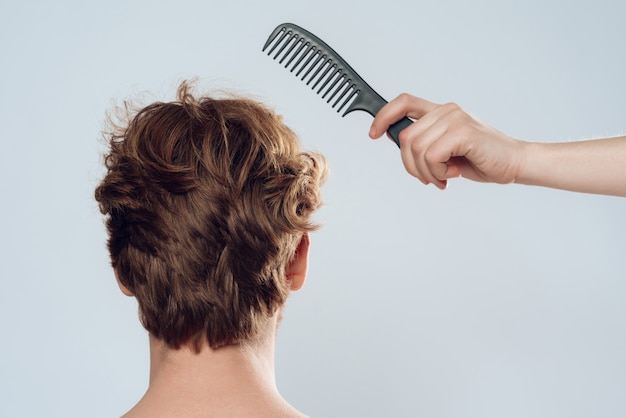 Female Hand Combs Hair Of Red Haired Man Back View Premium Photo