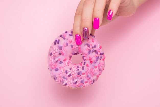 Premium Photo Female Hand Holding Donut