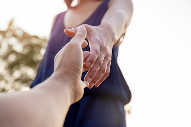 Female hands reaching out for help each other. Photo | Premium Download