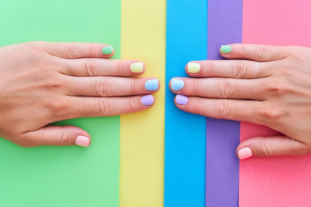 Premium Photo | Female hands with bright colors on a colorful background