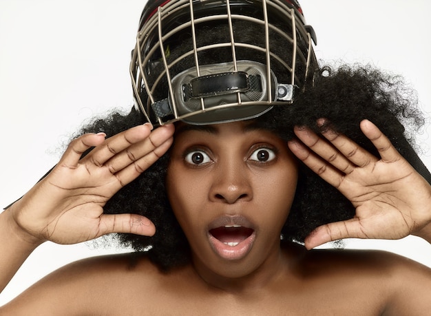 Free Photo Female Hockey Player Close Up Helmet And Mask Over White Wall African American Model