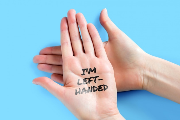 premium-photo-female-left-hand-with-the-words-i-am-left-handed