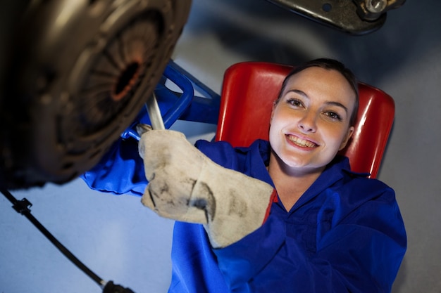 Female Mechanic Repairing A Car Free Photo