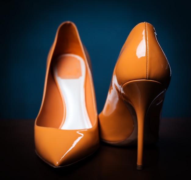 black and orange high heels