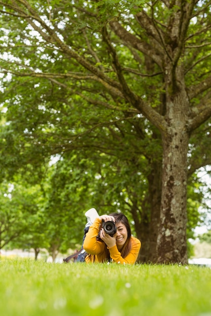 Premium Photo | Female photographer at park