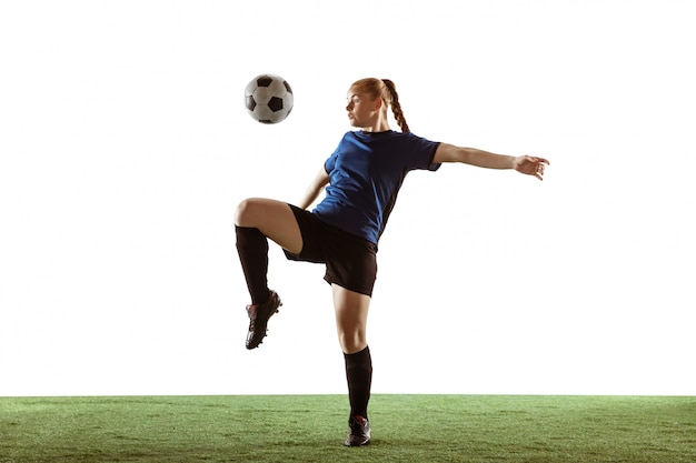 Female soccer, football player kicking ball, training in action and