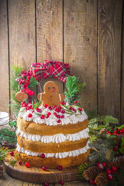 Premium Photo Festive Christmas Gingerbread Cake With Whipped Cream