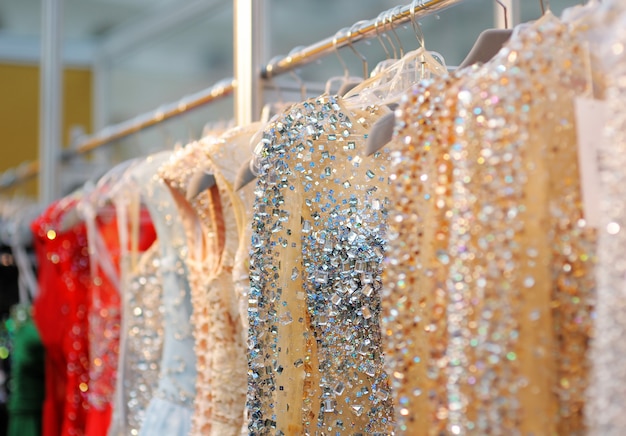 Premium Photo | A few beautiful wedding or evening dresses on a hanger