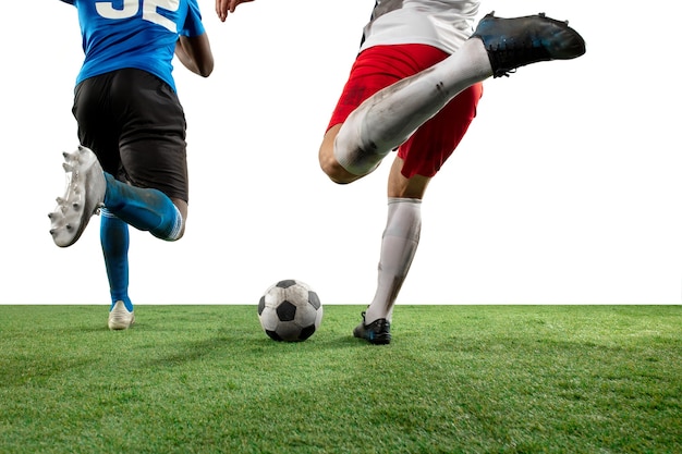 Free Photo Fighting Close Up Legs Of Professional Soccer Football Players Fighting For Ball On Field Isolated On White Wall Concept Of Action Motion High Tensioned Emotion During Game Cropped Image