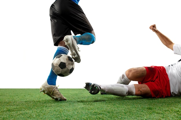 Free Photo Fighting Close Up Legs Of Professional Soccer Football Players Fighting For Ball On Field Isolated On White Wall Concept Of Action Motion High Tensioned Emotion During Game Cropped Image