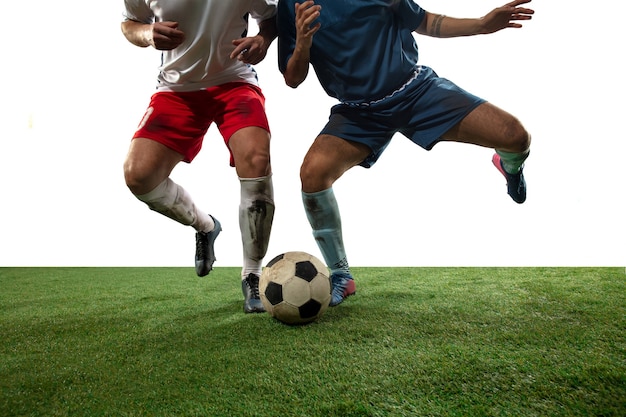 Free Photo Fighting Close Up Legs Of Professional Soccer Football Players Fighting For Ball On Field Isolated On White Wall Concept Of Action Motion High Tensioned Emotion During Game Cropped Image