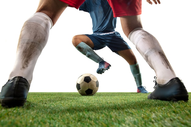 Free Photo Fighting Close Up Legs Of Professional Soccer Football Players Fighting For Ball On Field Isolated On White Wall Concept Of Action Motion High Tensioned Emotion During Game Cropped Image