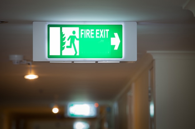 Premium Photo | Fire exit sign in the apartment