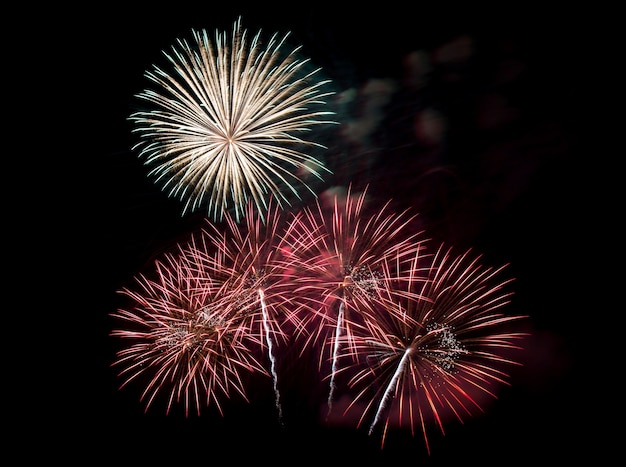 Premium Photo | Fireworks in the dark sky background