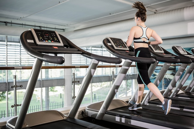 Premium Photo Fit Brunette Running On Treadmill At The Gym 6591