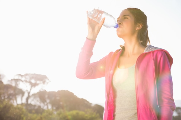 Premium Photo Fit Woman Drinking Water From Bottle 1585