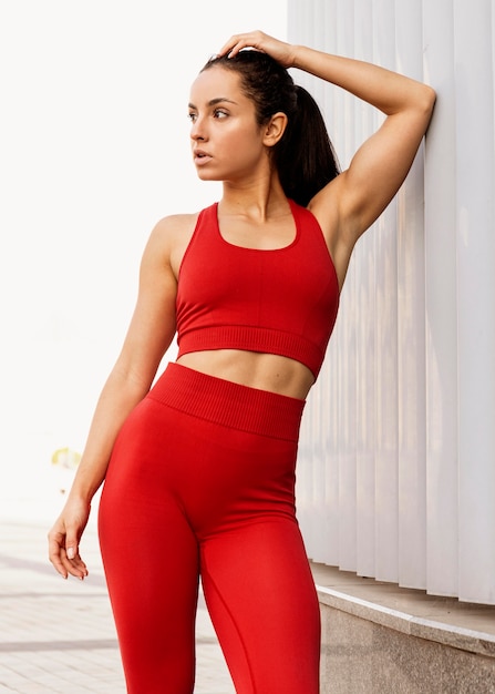 Free Photo | Fit young woman in sportswear posing