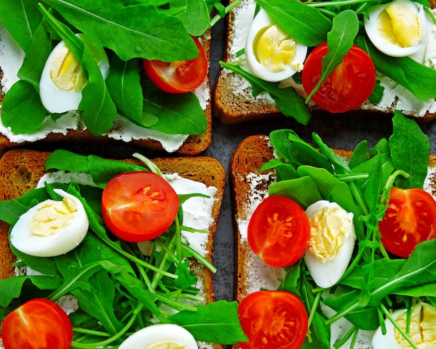 Premium Photo | Fitness toasts with arugula, cream cheese, cherry ...