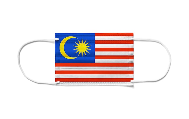 Premium Photo  Flag of malaysia on a disposable surgical mask.