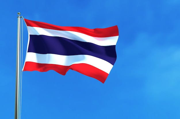 青い空の背景にタイの国旗 プレミアム写真