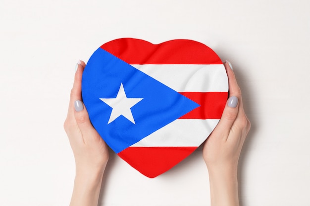 Premium Photo Flag Of Puerto Rico On A Heart Shaped Box In A Female Hands