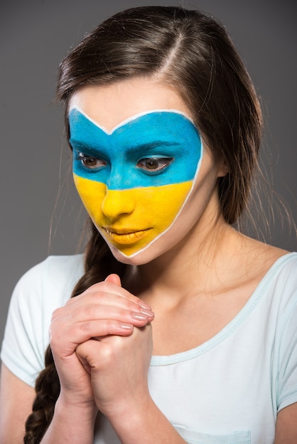 Premium Photo Flag Of Ukraine Painted On The Face Of The Beautiful Woman