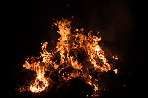 Premium Photo | Flames of bonfire at night. fire flames on a black ...