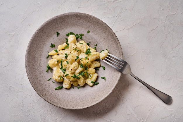 Premium Photo | Flat lay alpine dish gnocchi prepared with potato and ...