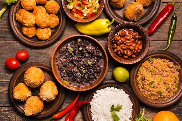 Flat lay assortment with delicious brazilian food Free Photo