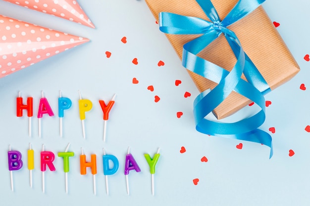Free Photo | Flat lay birthday arrangement with gift and party hat