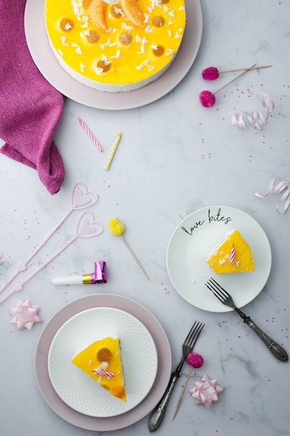 Free Photo | Flat lay of cake with slices and birthday decorations