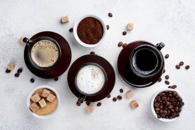 Free Photo | Flat lay of coffee cups on table