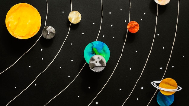 Free Photo | Flat lay creative paper planets composition